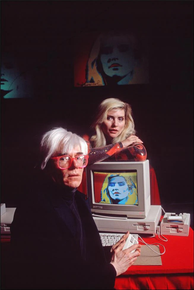 Andy Warhol and Debbie Harry, New York City, 1985, photographed by Allan Tannenbaum.