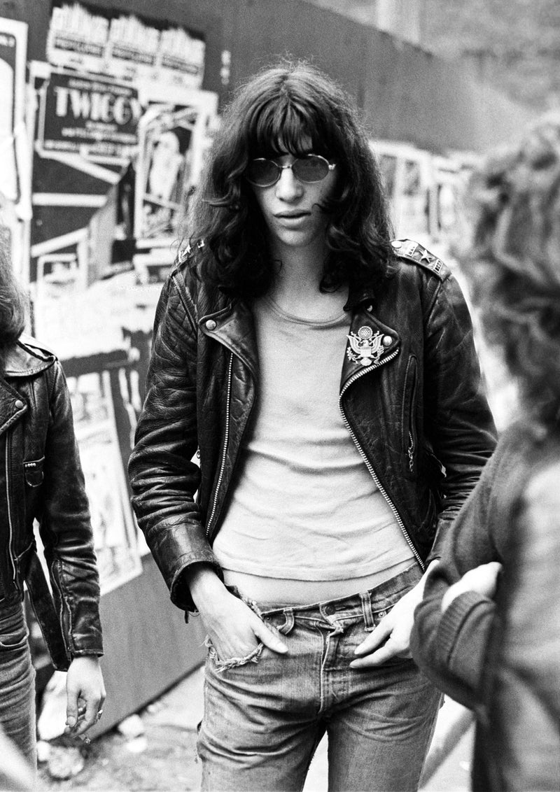 Joey Ramone of the Ramones walking in London, 1978, photographed by Ian Dickson