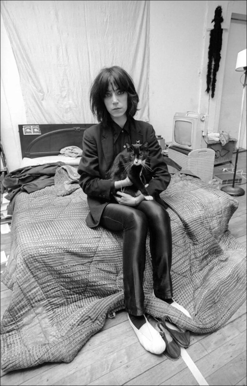 Patti Smith at home, New York, 1974, photographed by Allan Tannenbaum.