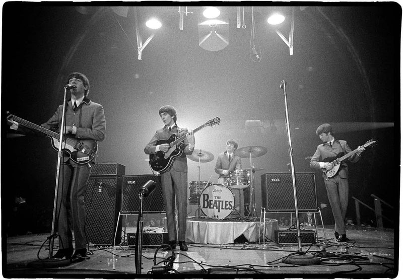 The Beatles performing live in Washington, DC during their first U.S. concert, photographed by Rowland Scherman, 1964.