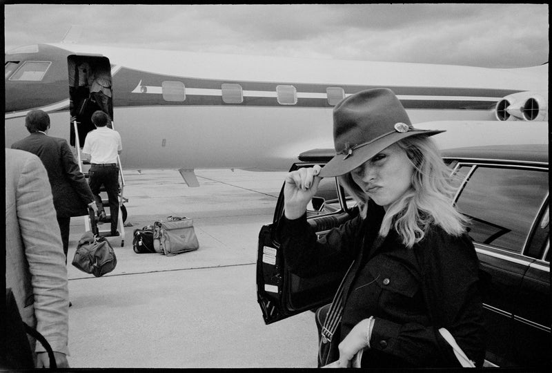 Debbie Harry boarding jet on tour, New York City, 1978