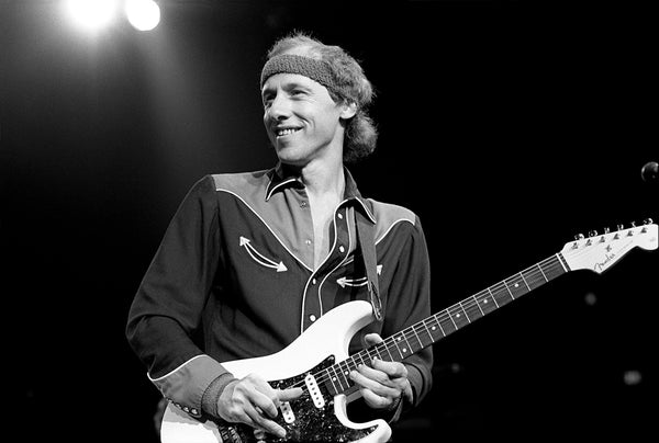 Mark Knopfler, Dire Straits by Ebet Roberts. Madison Square Garden, NYC, 1985