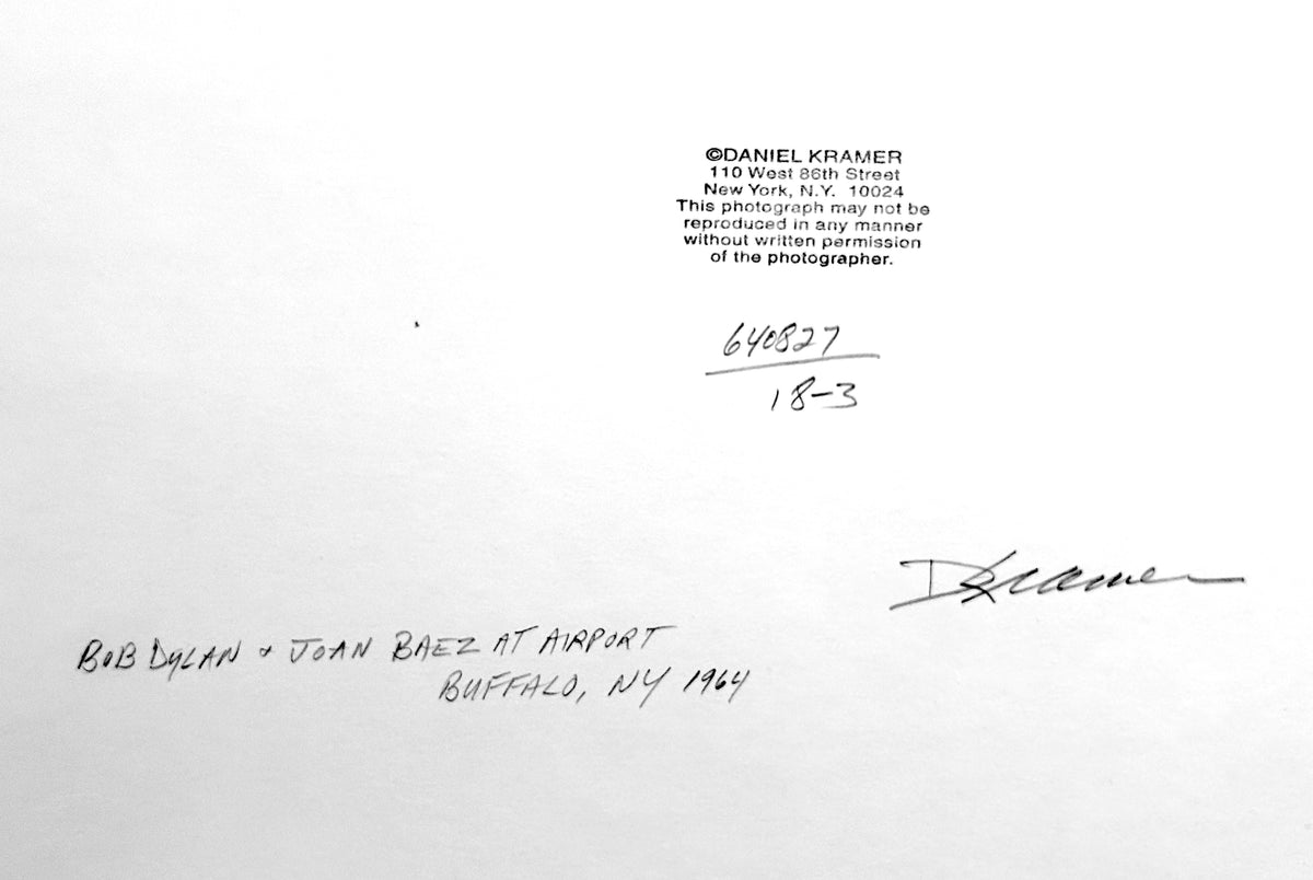 Verso of the artwork. Bob Dylan and Joan Baez at the airport in Buffalo, New York, 1964, photograph by Daniel Kramer
