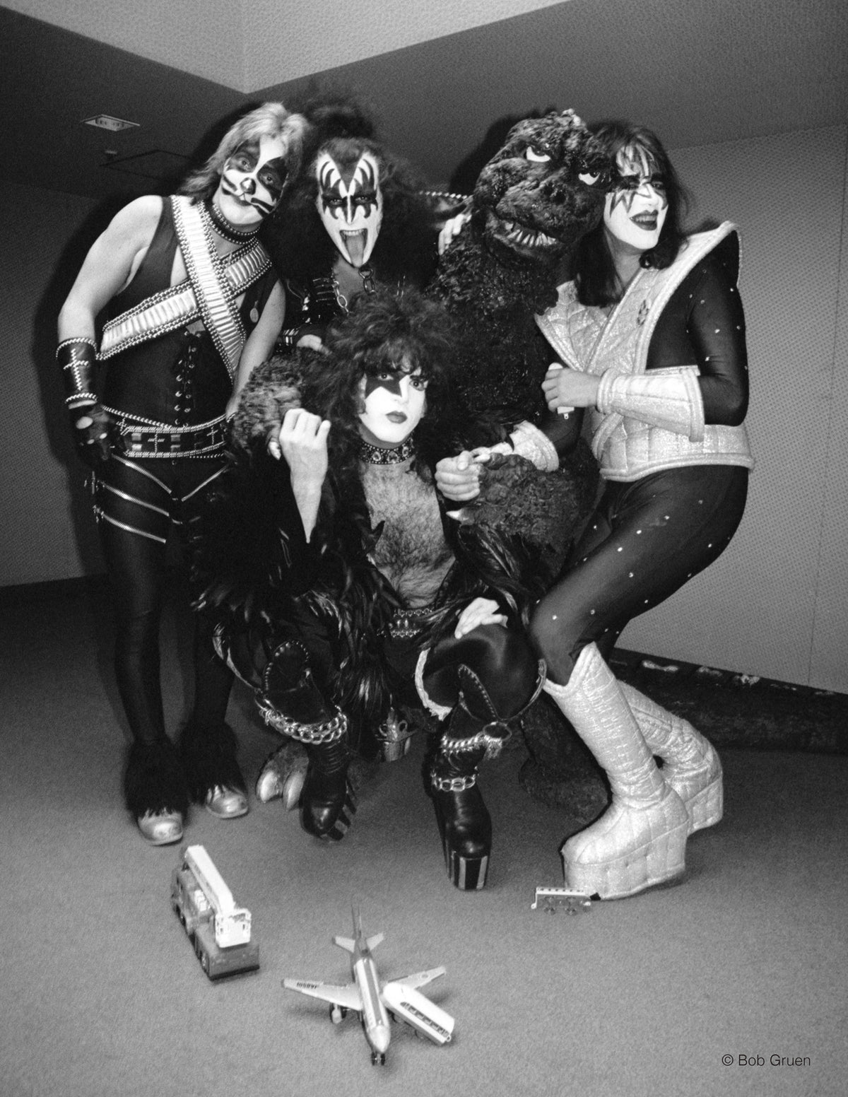 Kiss and Godzilla. Tokyo, Japan. Spring, 1978, photographed by Bob Gruen.