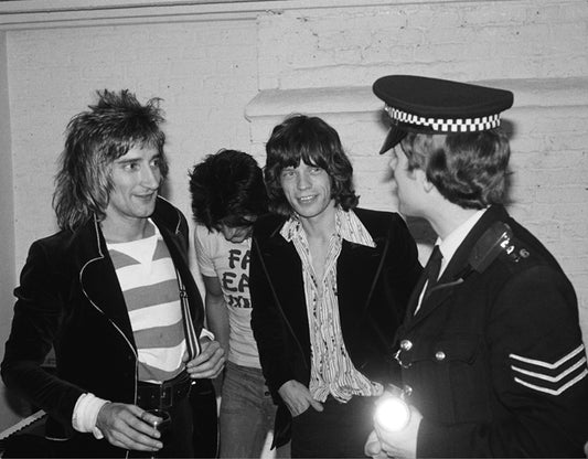 Rod Stewart, Mick Jagger and Ronnie Wood with the Police, 1975