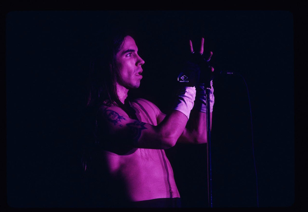 Anthony Kiedis of Red Hot Chili Peppers, Lollapalooza, 1992, photographed by Mark Weiss.