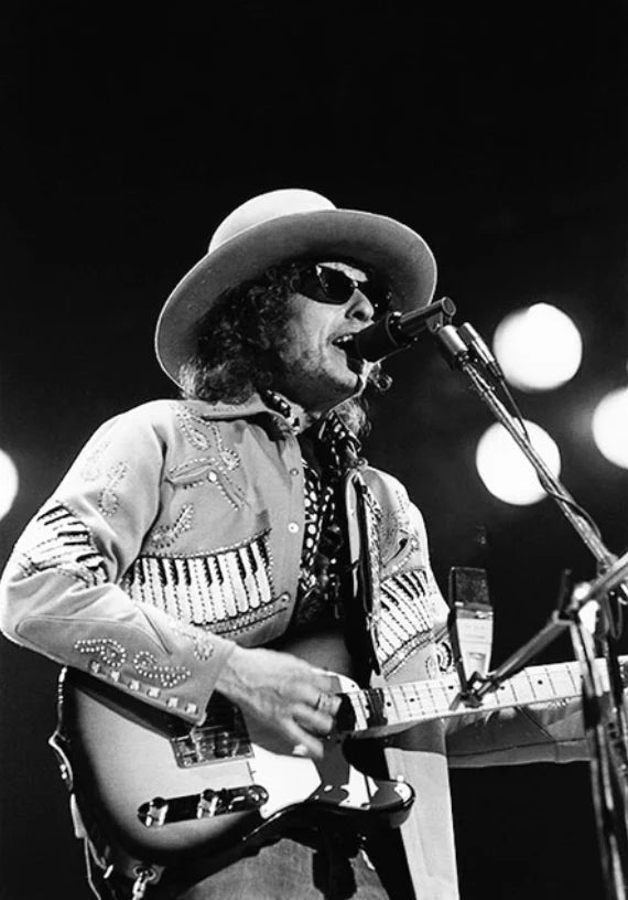 Bob Dylan at the Hurricane Carter benefit concert in New York City, photographed by Charilyn Zlotnik, 1976.