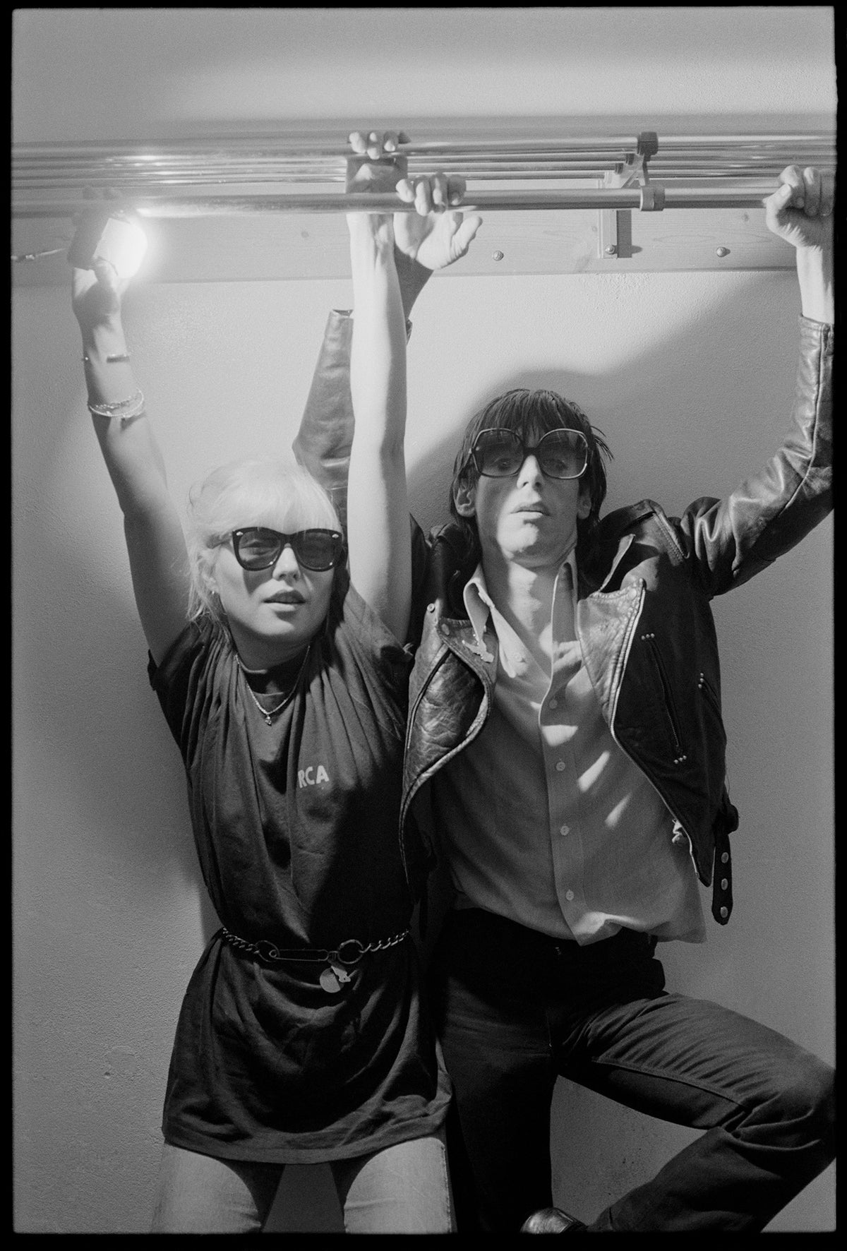 Debbie Harry and Iggy Pop wearing sunglasses, New York City, 1977, photographed by Chris Stein.