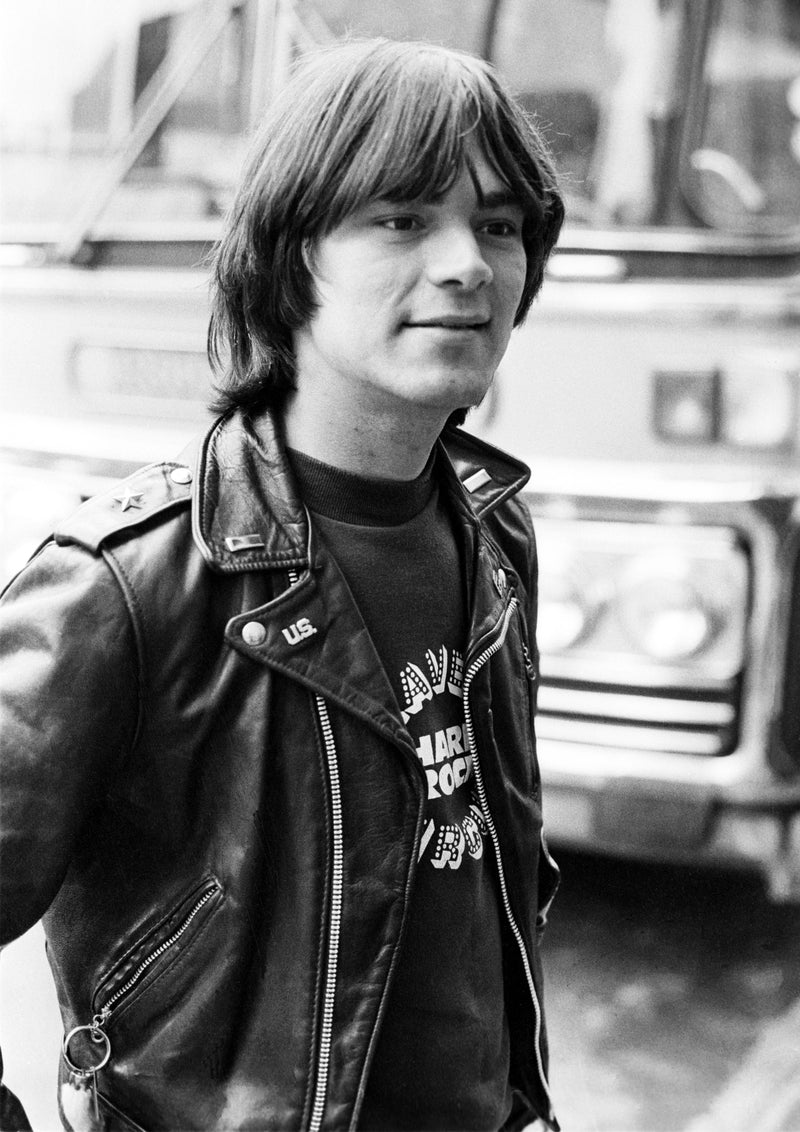 Dee Dee Ramone of the Ramones wearing a leather jacket in Liverpool, 1977, photographed by Ian Dickson.