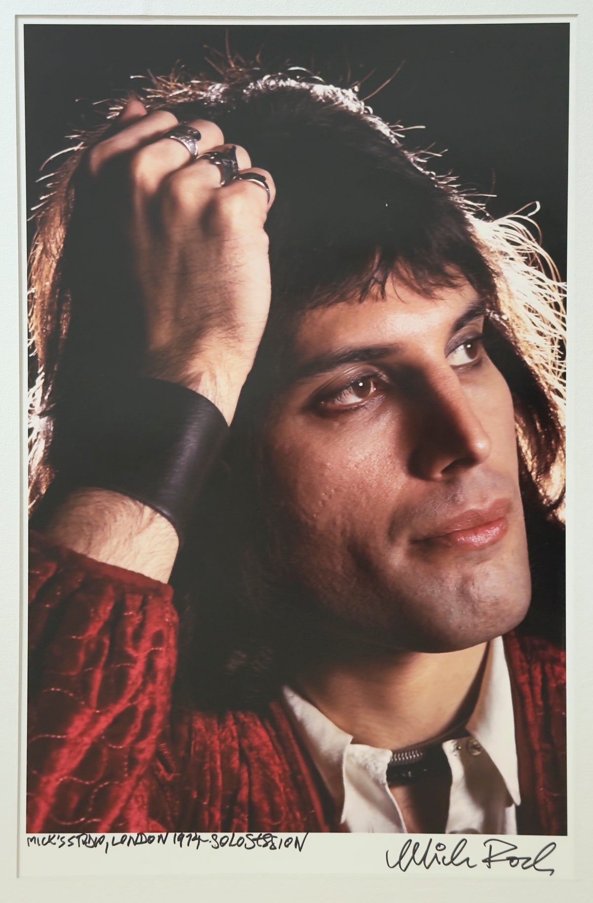 Freddie Mercury during a portrait session in London, UK, 1974, photographed and signed by Mick Rock.