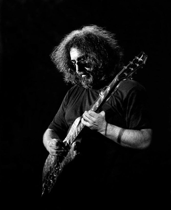 Jerry Garcia Playing Guitar, 1977, photographed by Patrick Harbron.