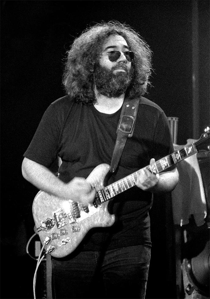 Jerry Garcia with Guitar, 1977, photographed by Patrick Harbron.
