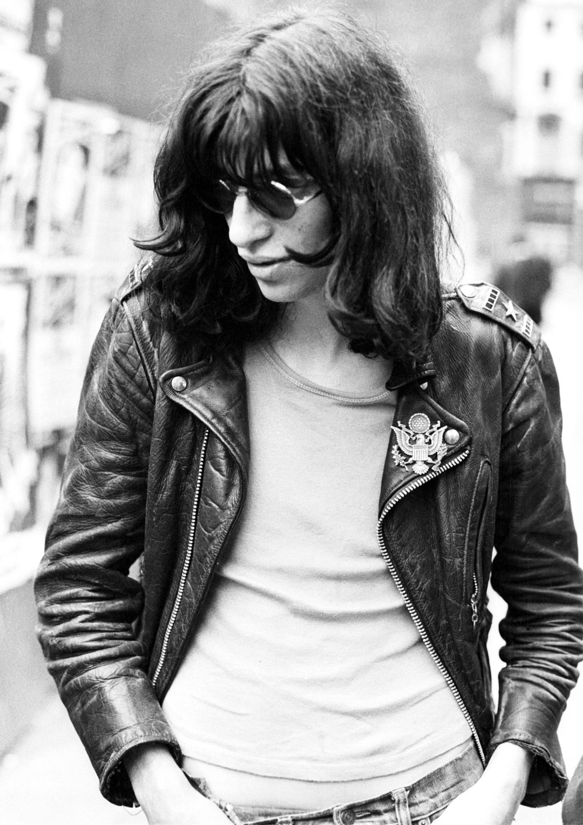 Joey Ramone at the site of the original Cavern Club in Liverpool, England, 1977, photographed by Ian Dickson.