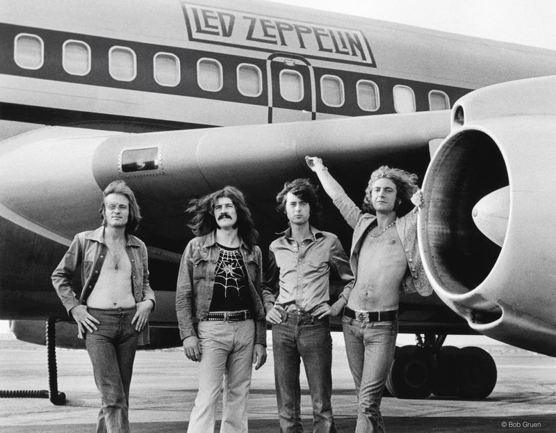 Led Zeppelin posing in front of The Starship in New York City, 1973, photographed by Bob Gruen.
