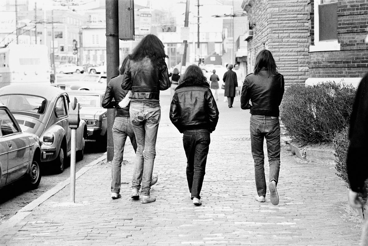 The Ramones photographed from behind on a London street, London, UK, 1976, photographed by Danny Fields.
