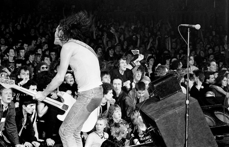 Ramones performing on stage in New York City, 1976, photographed by Danny Fields.