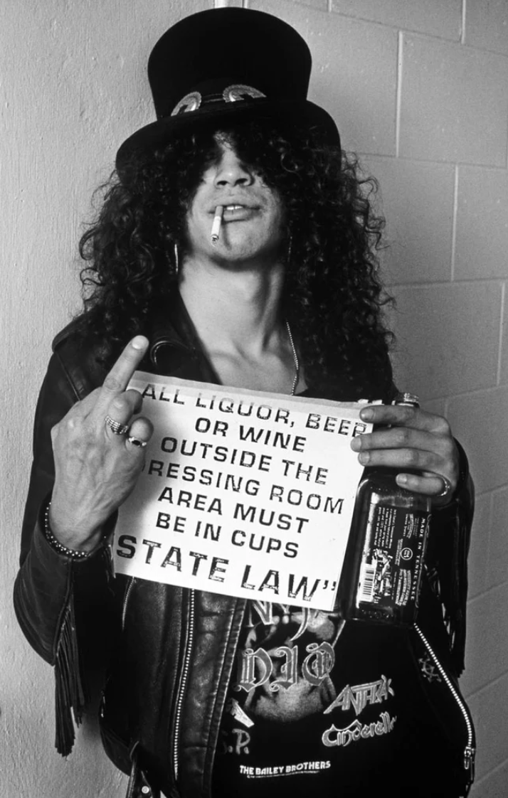 Slash of Guns N' Roses, Appetite for Destruction Tour, Florida, 1987, photographed by Mark Weiss.